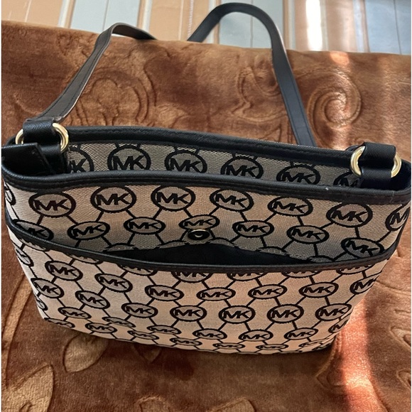 Michael Kors black and tan crossbody purse - Picture 3 of 6